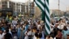 Supporters of religious and political party Jamaat-e-Islami protest in support of Kashmir in Karachi on August 5. 