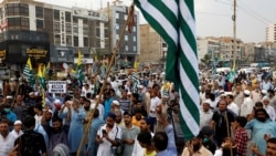 Supporters of religious and political party Jamaat-e-Islami protest in support of Kashmir in Karachi on August 5. 