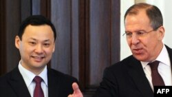 RussianForeign Minister Sergei Lavrov (R) and Kyrgyz counterpart Ruslan Kazakbaev at a meeting in Moscow in late March
