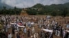 Flooding in a northwest Pakistani district has killed at least 340 people, officials said on Sunday, as rescuers pulled 54 more bodies overnight from homes flattened by flash floods and landslides.