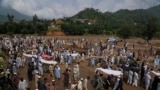Flooding in a northwest Pakistani district has killed at least 340 people, officials said on Sunday, as rescuers pulled 54 more bodies overnight from homes flattened by flash floods and landslides.