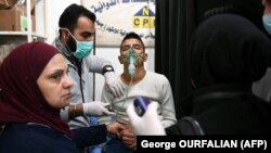 Приём пострадавших в сирийском госпитале после предполагаемой химической атаки, 24 ноября 2018