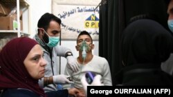  یکی از مجروحانی که گفته می‌شود هدف «حمله شیمیایی» قرار گرفته در بیمارستان حلب