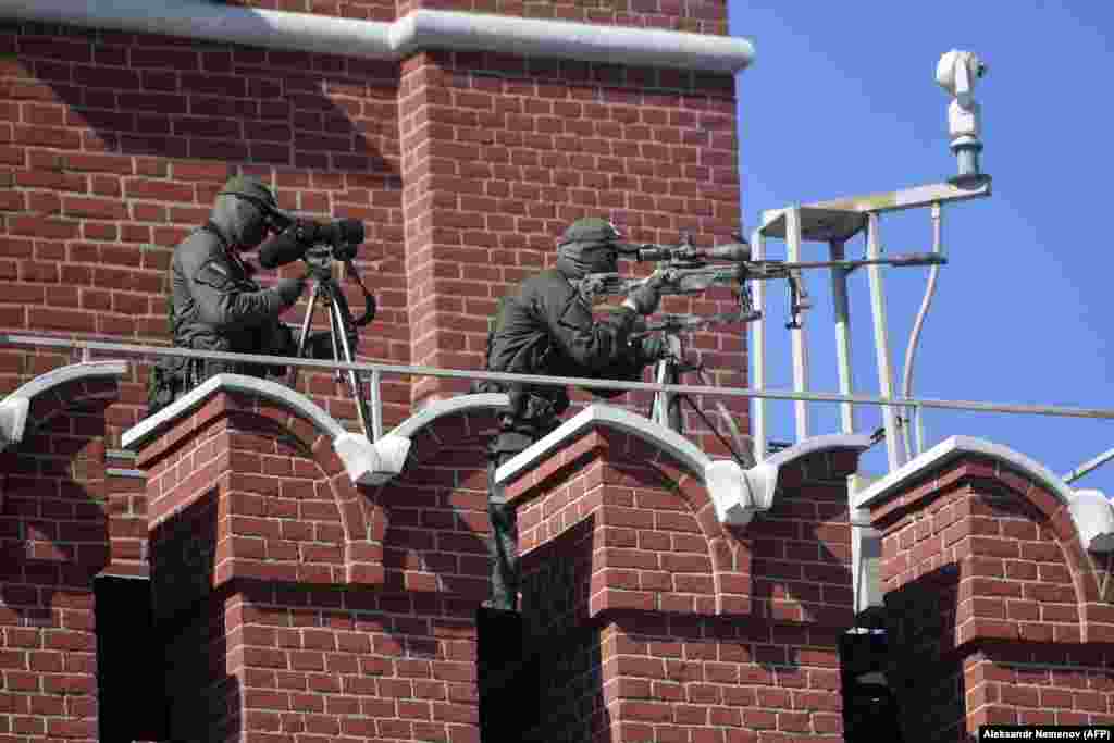 Russian snipers secured the area around the military parade.