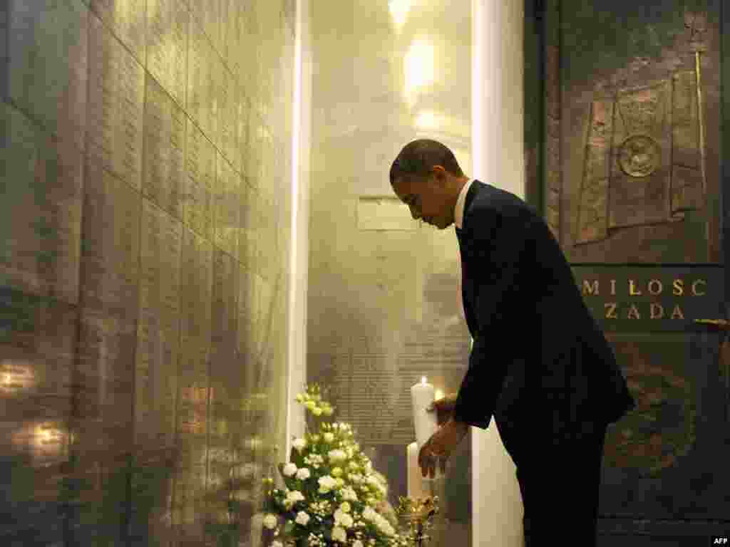 U.S. President Barack Obama at a memorial to victims of the Smolensk plane crash while on a visit to Poland on May 28.Photo by Jewel Samad for AFP