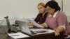 Kazakh activist Danaya Kaliyeva (left) and lawyer Zhanar Balgabayeva during her online trial on charges of contempt toward officials. She lost her case and had to pay a fine. 