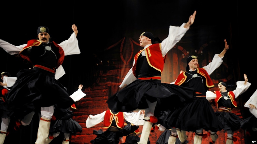 Members of Kosovo's state song and dance ensemble "Shota" perform at the national theatre in Pristina as part of celebrations to mark the fifth anniversary of the country's unilateral declaration of independence.