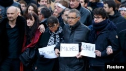 Родственники погибших в ходе терактов в Париже во главе шествия. 11 января 2015 года.