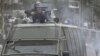 Egypt Protesters Defy Curfew, Battle Police
