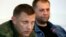 Окупований Донецьк, 11 серпня 2014 року. Тодішні ватажки угруповання «ДНР», що визнане в Україні терористичним, громадянин Росії Олександр Бородай (праворуч) і Олександр Захарченко