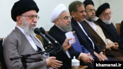 Iran's supreme Leader Ali Khamenei (L), in a meeting with Rouhani's cabinet on August 2016.