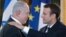 Presidenti francez, Emmanuel Macron (djathtas) dhe kryeministri izraelit, Benjamin Netanyahu.