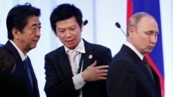 Премьер Японии Синдзо Абэ (слева) и президент России Владимир Путин. Осака, 29 июня 2019 года
