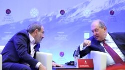 Armenia -- President Armen Sarkissian (R) and Prime Minister Nikol Pashinian attend a conference in Dilijan, June 8, 2019.