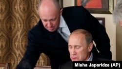 Евгений Пригожин и президент России Владимир Путин