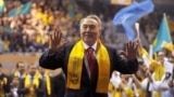 Kazakhstan - (FILES) In this file photo taken on April 04, 2011 Kazakh President Nursultan Nazarbayev greets his supporters during a celebration rally at a sports center in Astana. - Kazakhstan President Nursultan Nazarbayev announced his shock resignatio