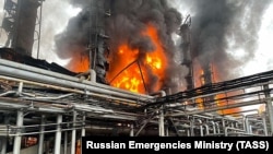 Firefighters battle a fire at the Novy Urengoy condensate treatment plant on August 5.