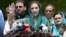 FILE: Maryam Nawaz (C), daughter of former Prime Minister Nawaz Sharif, talks to journalists after appearing before an investigation team in Islamabad on July 5.