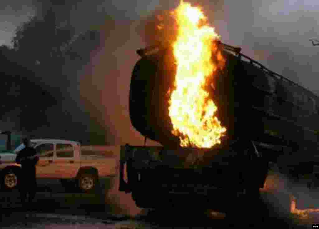 An oil tanker truck burns in Jalalabad following a Taliban bomb explosion in July (epa) - To mark the fifth anniversary of 9/11 terrorist attacks in the United States, RFE/RL spoke with former Taliban spokesman Mullah Abdul Salem Zaeef. Zaeef expressed no regrets for "defending Islam and the rights of Afghanistan."