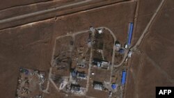تصویر ماهواره‌ای پایگاه سپاه پاسداران در بیدگنه، پس از انفجار.