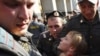 Injured Russian Journalist Files Lawsuit Against Police