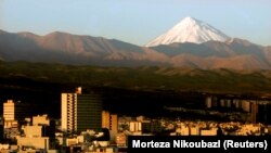 Mount Damavand, a potentially active volcano 66 km (41 miles) northeast of the Iranian capital Tehran. 