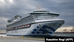 The Diamond Princess cruise ship, with over 3,700 people quarantined on board due to fears of the new coronavirus, arrives at the Daikoku Pier Cruise Terminal in Yokohama port on February 6.