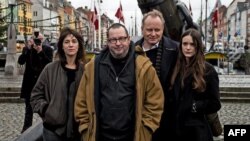 Denmark - Director Lars Von Trier (C) and actors who starred in his "Nymphomaniac" film during its premiere in Copenhagen.