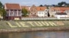 Lithuania - The view of painted word 'Lithuania' with a basketball on a side of Neman River embankment in Kaunas old town (Lithuania). Embankment in Kaunas with incriiption LIETUVA, undated