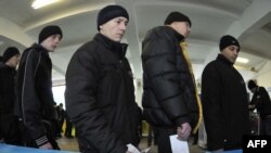 Ukrainian prison inmates wait to vote in the presidential election in January, eventually won by Viktor Yanukovych.