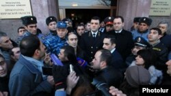 Armenia - Prosecutor-General Kostanian (C) addresses protesters in Gyumri, 15Jan2015.