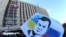 A demonstrator holds a flag with a portrait of ousted Ukrainian President Viktor Yanukovych during a rally of pro-Russia supporters outside the regional government administration building in the center of the eastern Ukrainian city of Donetsk on April 5. 