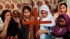 FILE: Pakistani Christians pray for Asia Bibi, a Catholic mother of five who has been on death row since 2010 accused of blasphemy in Multan (October).