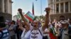  Protesters shout anti-government slogans during a protest in the Bulgarian capital, Sofia, on September 10.