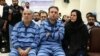 از سمت راست: نجوا لاشیدایی و وحید بهزادی، زوجی که به اتهام «اخلال در نظام ارز و اقتصادی خودرو» در ایران به اعدام محکوم شده‌اند