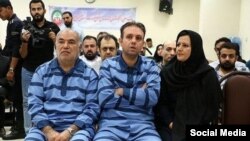 Vahid Behzadi and Najva Lashidayi, defendants in disrupting Iran's foreign exchange market case. 
