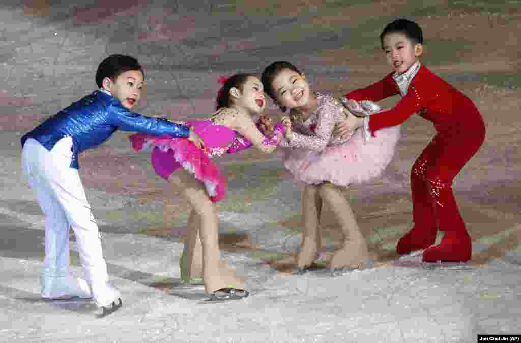 Young figure skaters perform during a festival celebrating the upcoming birthday of leader Kim Jong Il in Pyongyang, North Korea. (AP/Jon Chol Jin)