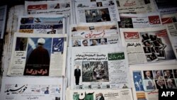 Фотографии утвержденных и дисквалифицированных кандидатов на участие в президентских выборах в Иране 14 июня. 