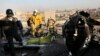 Iran -- Debris is seen from an Ukrainian plane which crashed as authorities work at the scene in Shahedshahr, southwest of Tehran, January 8, 2020. 