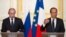 Russian President Vladimir Putin (left) with his French counterpart Francois Hollande in Paris