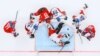Russian and Czech ice hockey players take part in a goalmouth scramble during their Euro Hockey Tour match in Moscow. (Reuters/Evgenia Novozhenina)