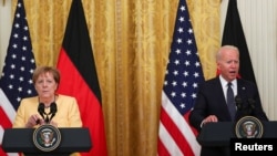 Ангела Меркел и Джо Байдън по време на съвместна пресконференция в Белия дом на 16 юли