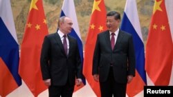 Președintele rus Vladimir Putin și liderul chinez Xi Jinping, la Beijing, China