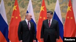 Predsednik Rusije Vladimir Putin i predsednik Kine Si Đinping na sastanku uoči otvaranja Zimskih olimpijskih igara, 4. februar 2022.