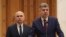 Premierul Marcel Ciolacu (dreapta) și Ilie Bolojan, președintele PNL, partenerul său în coaliția de guvernare împreună cu UDMR.