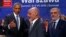 U.S. President Barack Obama (L) gestures next to Afghanistan's President Ashraf Ghani (C) and Afghanistan's Chief Executive Abdullah Abdullah at the NATO Summit in Warsaw, Poland on July 9.