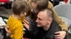 Freed RFE/RL Journalist Kuznechyk Feels 'Weight Lifted' At Seeing His Family