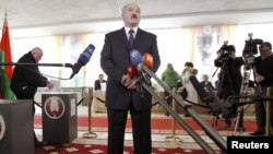 Belarusian President Alyaksandr Lukashenka at a favorite haunt: in front of a microphone.