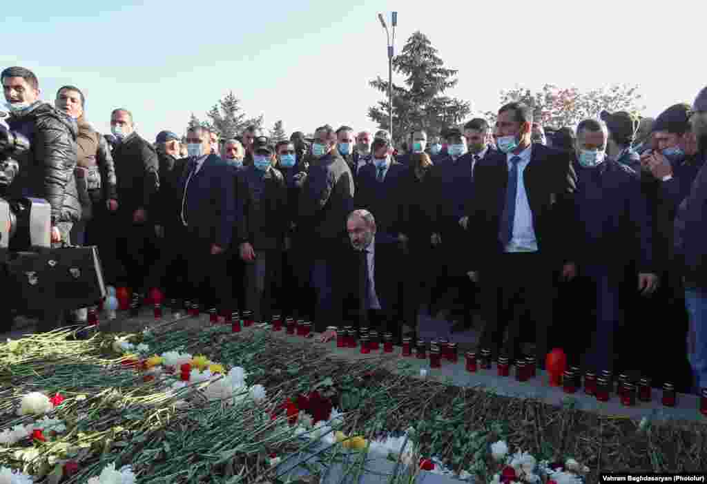 Amidst scuffles, the Armenian prime minister pays his respects at the military cemetery. Many Armenians are angered by Pashinian&#39;s handling of the conflict and shock announcement of a peace treaty that ceded swaths of land formerly controlled by ethnic Armenian forces back to Azerbaijan.&nbsp;