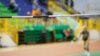 GENERIC – Unrecognizable sportswoman before high jump attempt over bar on track and field competition